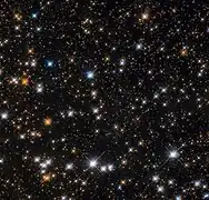 Une portion de Messier 11 par le télescope spatial Hubble.